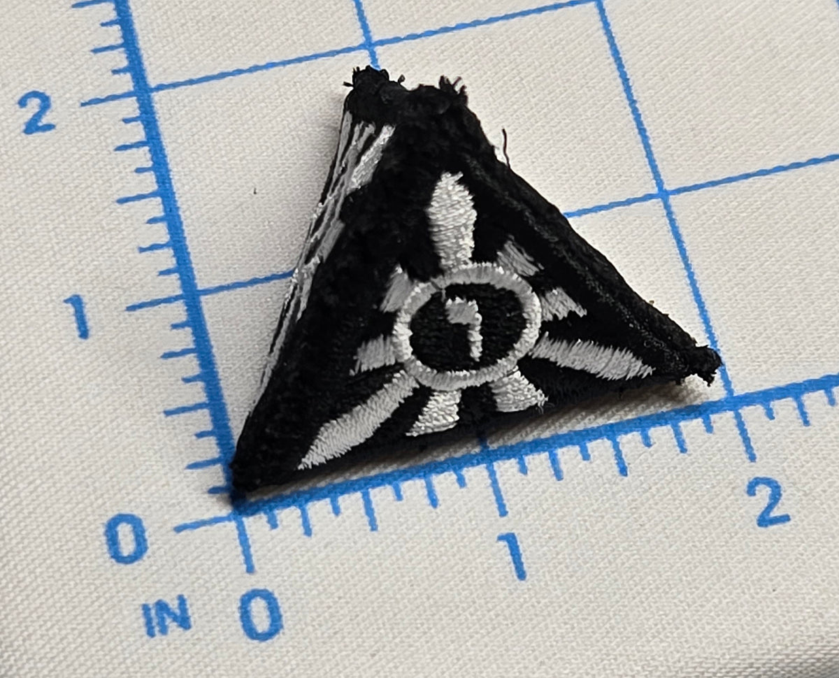 Embroidered Tetrahedron Tetragrammaton