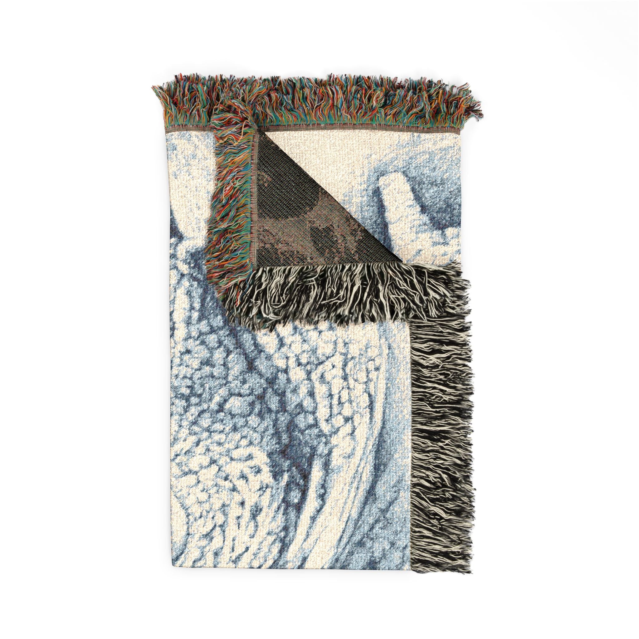 Textured rug with fringes on a white background