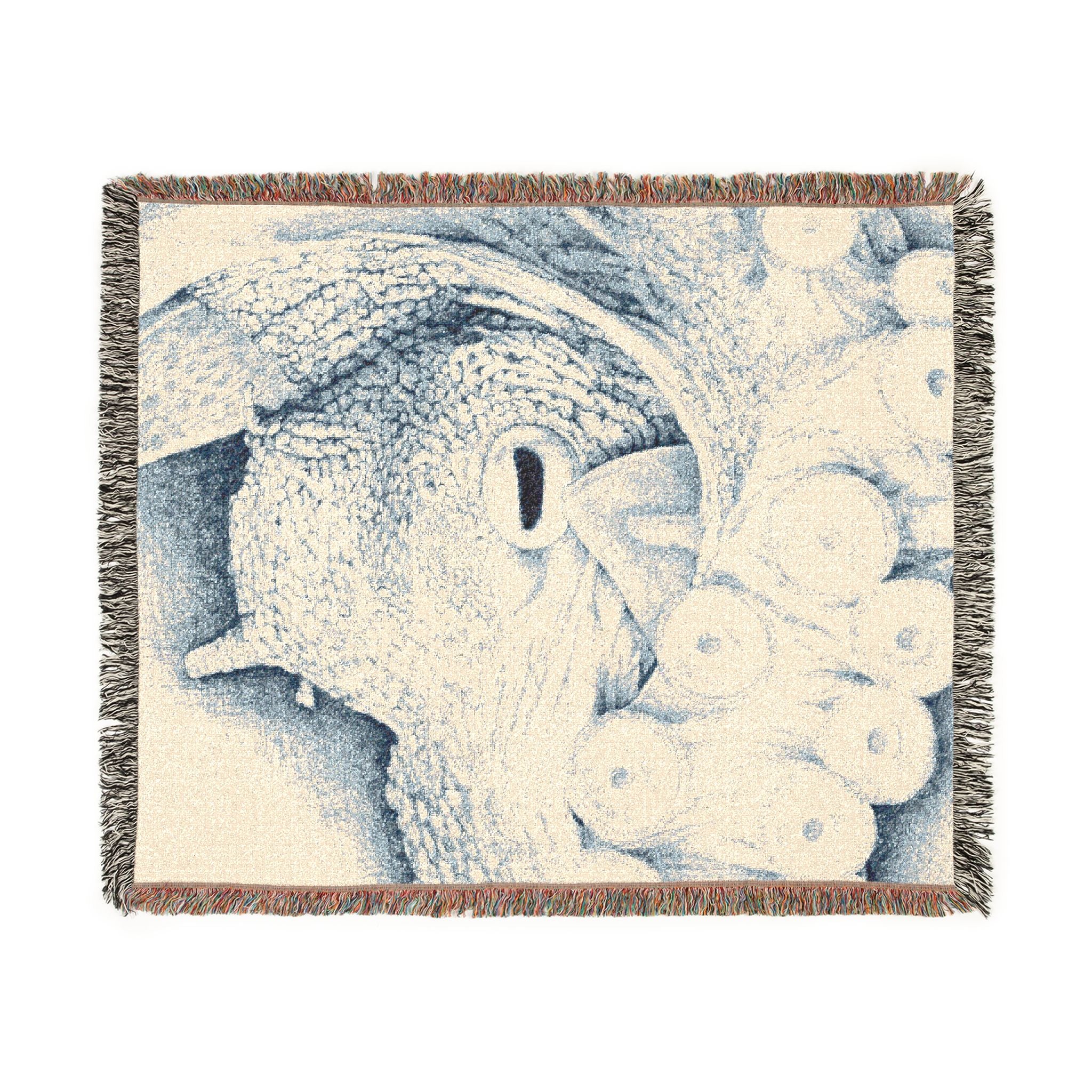 Blanket with a blue and white pattern on a beige background